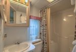Private bathroom furnished with towels